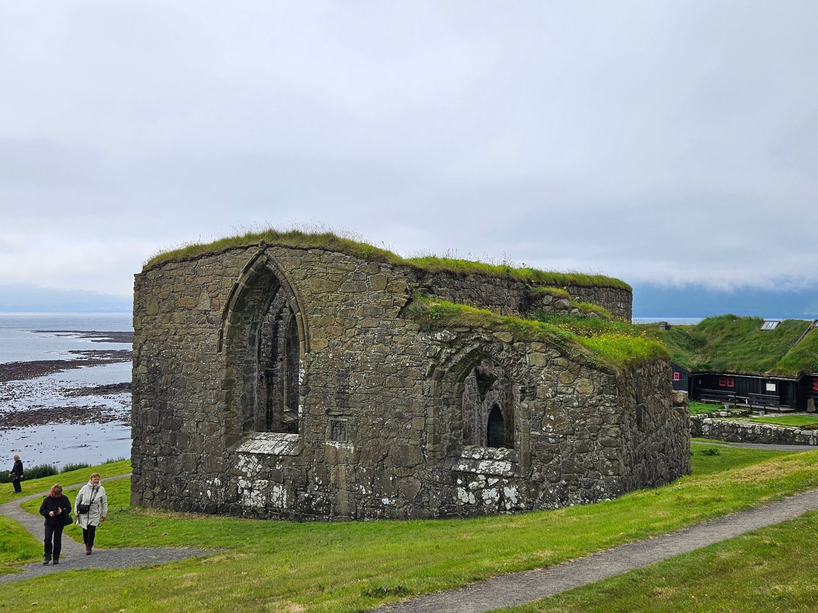 Kirkjubømúrurin, a monumental old church standing in Kirkjubøur Faroe Islands